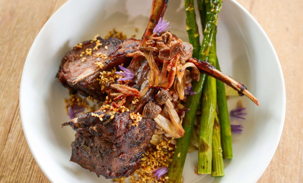 anise roasted lamb with caramelized fennel faro, crisp enoki mushrooms, grilled spring asparagus, and toasted sesame seed masala garnish
